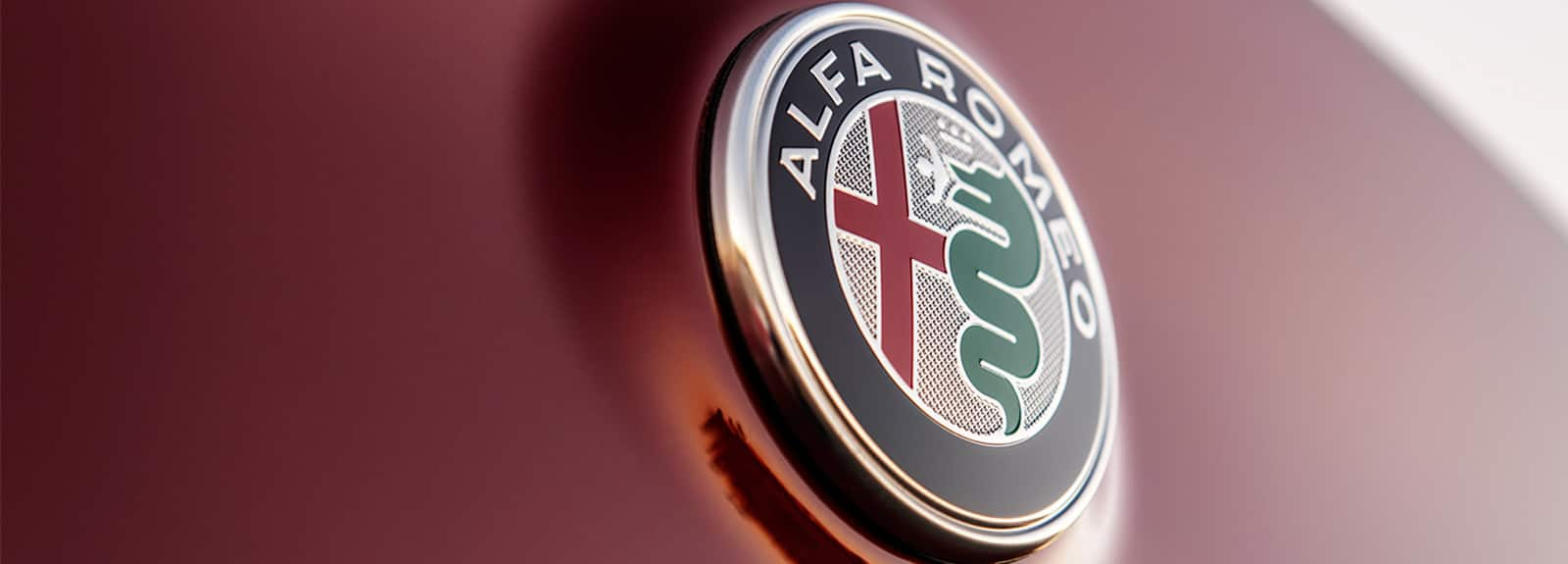 A close-up of the Alfa Romeo badge.